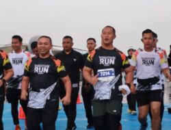 Semangat Kebugaran dan Soliditas TNI Bersama Masyarakat, Danlanal Dumai Hadiri Roesmin Nurjadin Fighter Run 2025